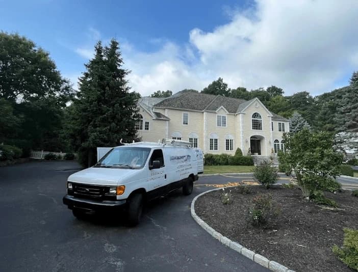 Solon Power Washing technician performing thorough gutter cleaning service in Solon