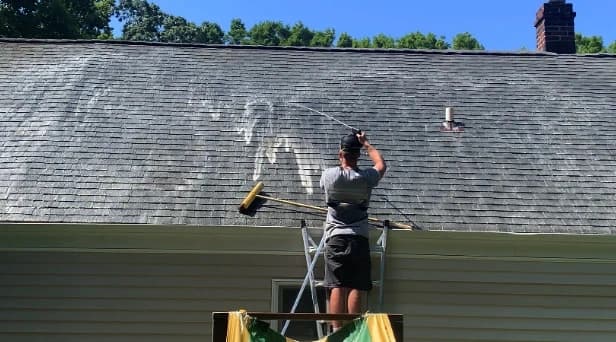 Before and after results of roof washing by Solon Power Washing in Solon