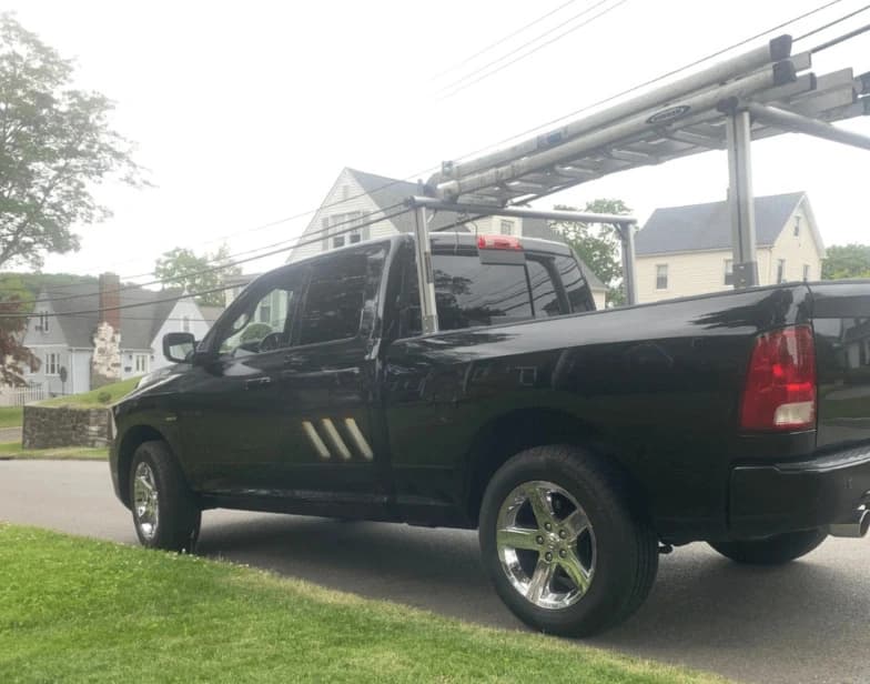 Fleet vehicle cleaning service being performed by Solon Power Washing in Solon